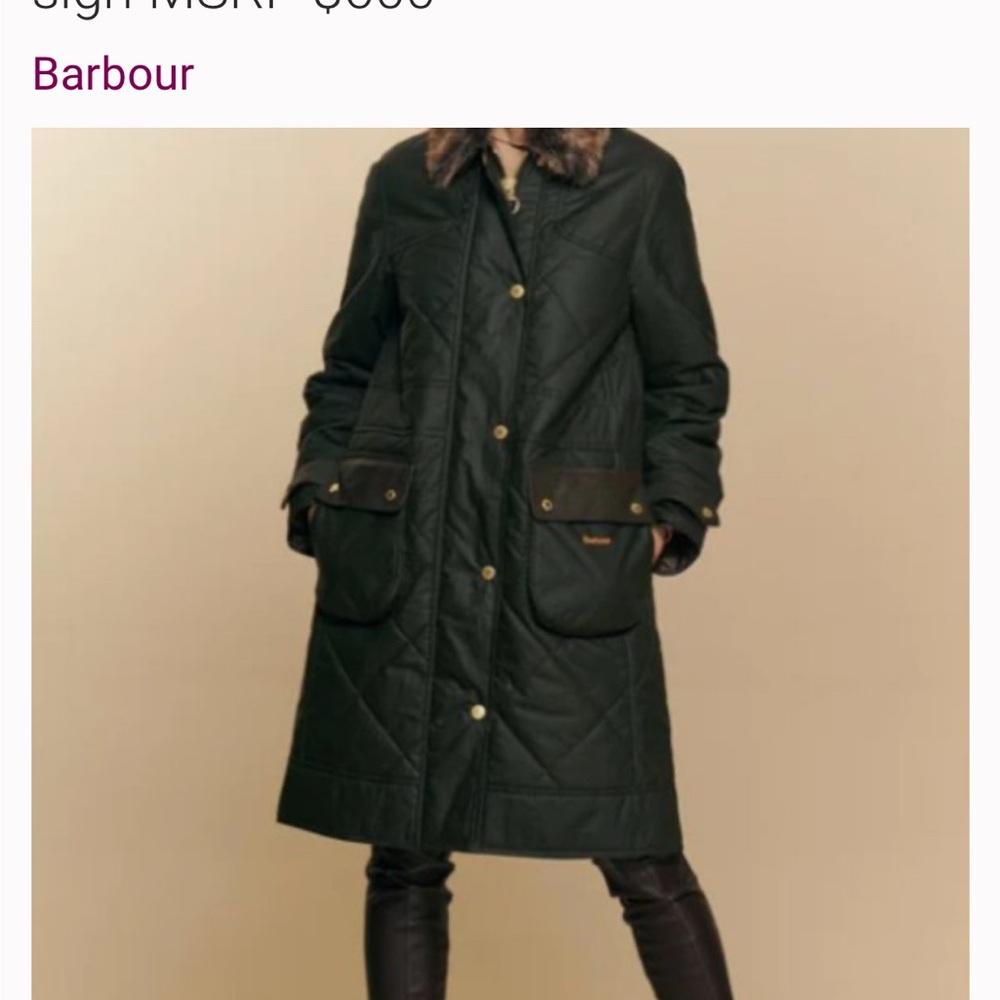 Barbour Green oilskin jacket with fur trim on the hood.